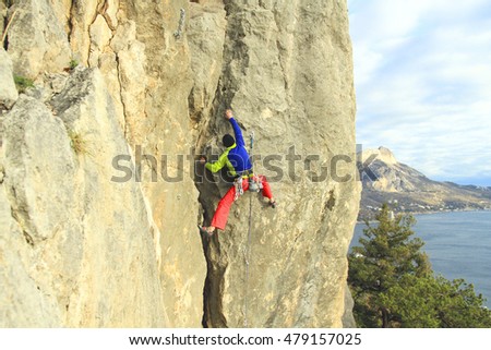 Rock climber to climb the wall.