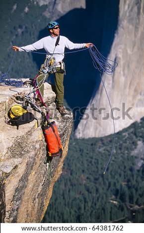 Rock climbing team bivouaced in a storm.