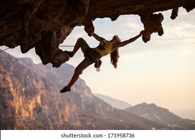 Rock climber at sunset, Kalymnos Island, Greece  - Shutterstock ID 171958736