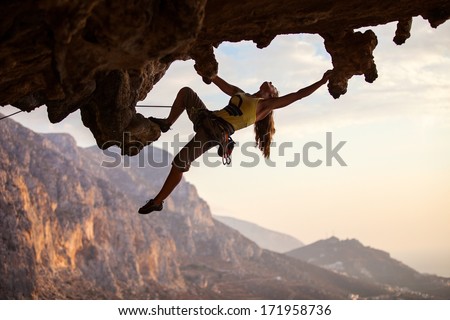 Rock climber at sunset, Kalymnos Island, Greece 