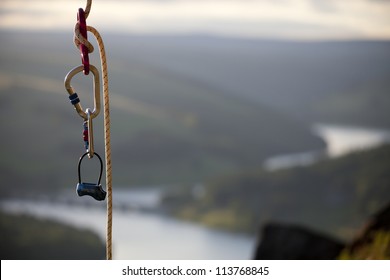 Rock Climbing Rope With Hooks Overlooking A Nice View