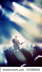 Rock Concert Stage. Guitarist Playing On Electric Guitar.