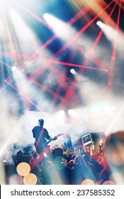 Rock Concert Stage. Guitarist Playing On Electric Guitar.