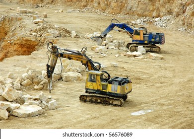 Rock Crusher And Digger In Quarry