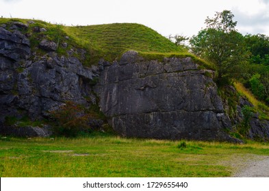 Rock Face In Hills With Trees