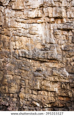 Rock face texture of large rocky cliffs