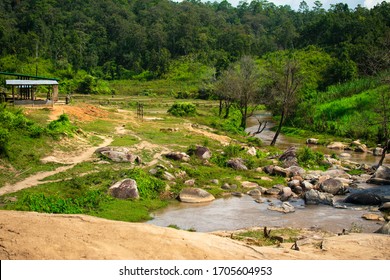 A Rock Filled River Meandering Through The Jungle Elephant Sanctuary In Chiang Mai In Thailand