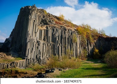 Rock formation natural monument Basalt organ. Polygonal structures of basalt columnar separation in Panska skala near Kamenicky Senov, northern Bohemia, Czech Republic. October 21, 2018