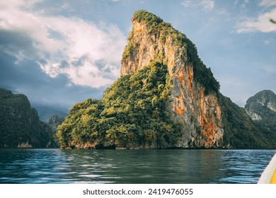 A rock formation in Phang Nga Bay, between southern Thailand's mainland and Phuket Island.

Also known as Ao Phang Nga National Park, it's characterized by limestone cliffs and rock formations. - Powered by Shutterstock