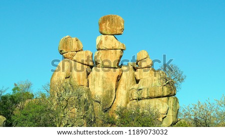 Rock formation,Mom with two sons