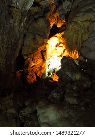 Rock Formations At Black Chasm Cavern In Northern California. Stalactites, Stalagmites And Columns Are Illuminated By The Park Lighting System.