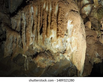 Rock Formations At Black Chasm Cavern In Northern California. Stalactites, Stalagmites And Columns Are Illuminated By The Park Lighting System.