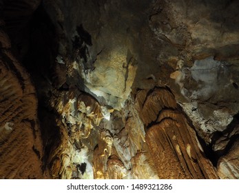 Rock Formations At Black Chasm Cavern In Northern California. Stalactites, Stalagmites And Columns Are Illuminated By The Park Lighting System.