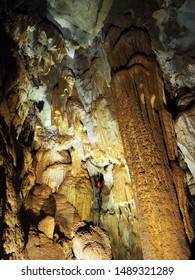 Rock Formations At Black Chasm Cavern In Northern California. Stalactites, Stalagmites And Columns Are Illuminated By The Park Lighting System.