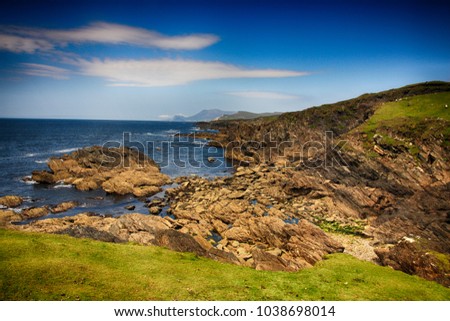Rock formations at coast, Dumha Eige, Achill Island, County Mayo, Connacht, Republic of Ireland, cliffs and mountin