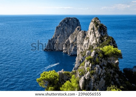 Rock formations Faraglioni, Island Capri, Gulf of Naples, Italy, Europe.
Rock formations Faraglione di terra Stella, Faraglione di mezzo, Faraglione di fuori Scopolo.
