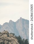 Rock formations and forests create breathtaking views on a cloudy day in Estes Park, Colorado