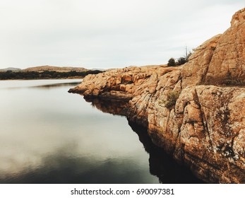 Rock formations on the water - Shutterstock ID 690097381