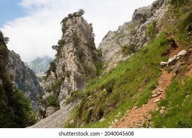 Rock Formations Or Pilar Beside A Well-known Hiking Route Through A Narrow And Steep Gorge With A Carved Hiking Trail Along The River Cares