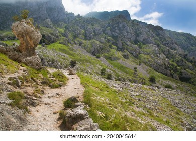 Rock Formations Or Pilar Beside A Well-known Hiking Route Through A Narrow And Steep Gorge With A Carved Hiking Trail Along The River Cares