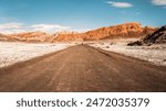 Rock formations, sand dunes and white evaporites in the Moon Valley (Valle de la Luna), San Pedro de Atacama, Chile