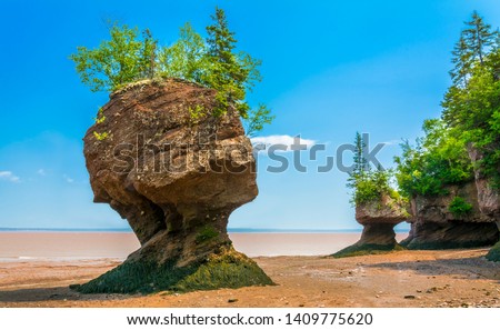 Rock formations that have been sculpted by nature over many centeries. Hopewell Cape at the Bay of Fundy, New Brunswick.
