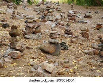 rock garden, many small stone pyramids, a place of ancient pagan rituals