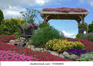 Rock Garden With Waterfall And Wooden Trellis