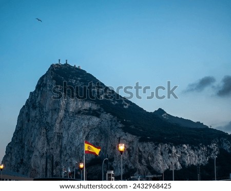 Rock of Gibraltar. Sunset landscape. Spanish flag.