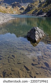 A Rock In The Lake, In Belledonne Moutain Range