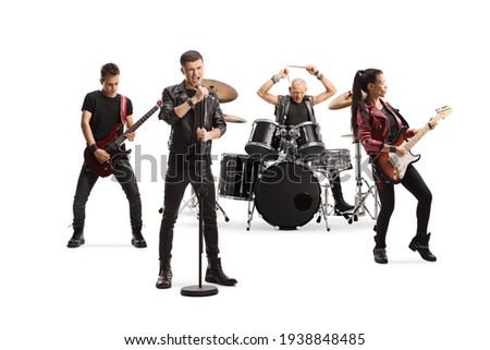 Rock music band performing with female guitarist, drummer and a male singer isolated on white background
