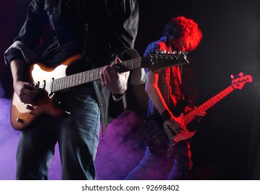 Rock Musicians Playing At A Live Concert