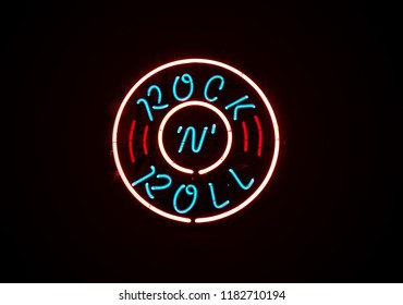 Rock N Roll Neon Sign On Dark Background                               