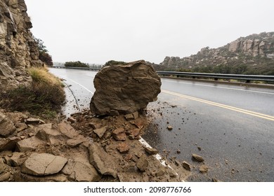 Rock From Rain Storm Landslide Blocking Traffic Lane On Santa Susana Pass Road In Los Angeles, California.  