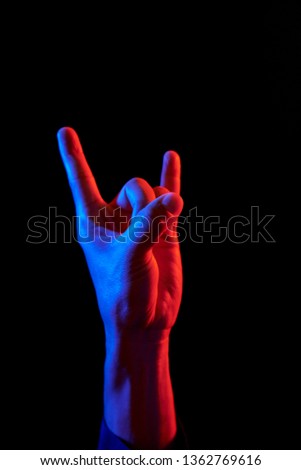 Similar – Image, Stock Photo Woman making a rock sign with her hand