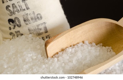 Rock Salt In Stenciled Bag And Wooden Scoop