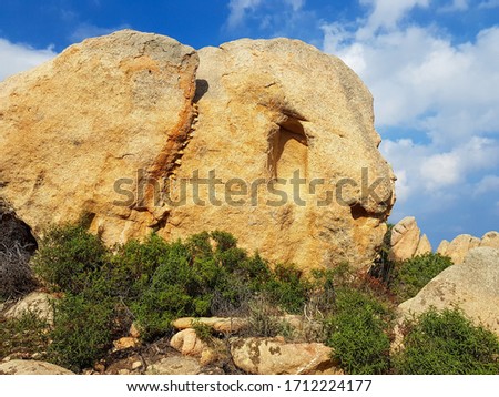 Rock shaped like Lord Voldemort on a hiking trail in Sardinia