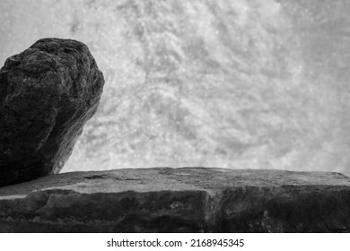 A Rock Shelf For A Product Display, Showing Selective Focus To The Middle Top Flat Surface Of The Textured Stone, With A Light Bokeh Balls Background.