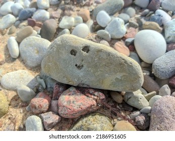 Rock With Smile Face On It