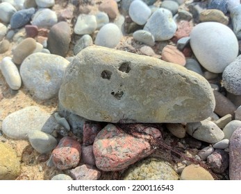 Rock With Smile Face On It