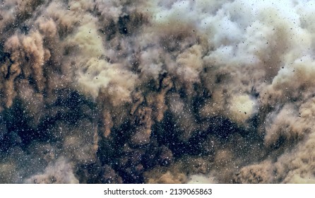 Rock Splash And Limestone Dust Storm After Detonator Blast On The Mining Site In The Middle East 