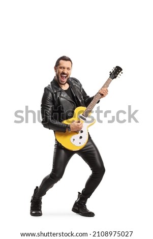 Rock star playing an electric guitar and singing isolated on white background