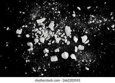 Rock stone broken splash explosion isolated on black background - Shutterstock ID 1662203593