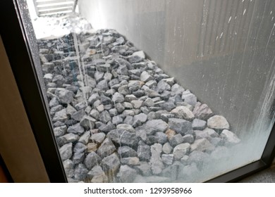 rock stone from glass window - Powered by Shutterstock