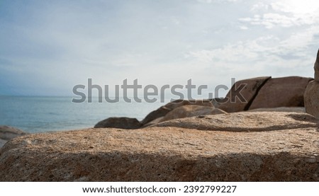 Rock Stone podium on seaside with daylight, well display product background and text on free space