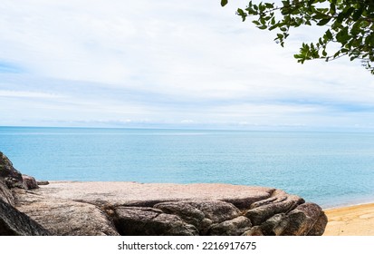 Rock Stone Stage in nature with Sea sand Beach seashore Landscape and blue sky nature Background well editing montage Displays product tourism 
