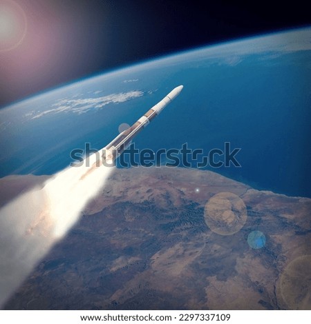 Rocket above the earth. The elements of this image furnished by NASA.
