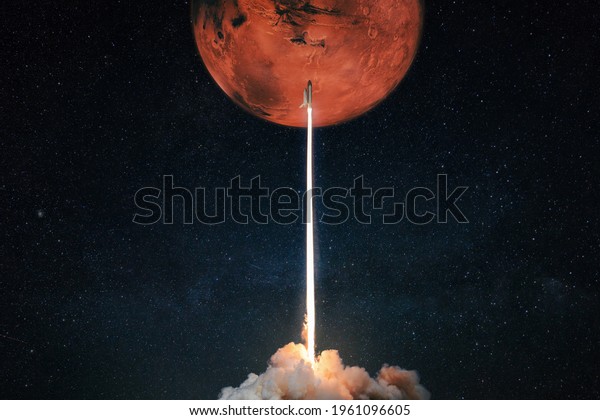 Rocket with blast and smoke takes off to the red\
planet mars mars, concept. Spacecraft lift off to explore other\
planets. Rocket launch