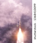 Rocket and clouds. Taking off from ground, lift off. The elements of this image furnished by NASA.