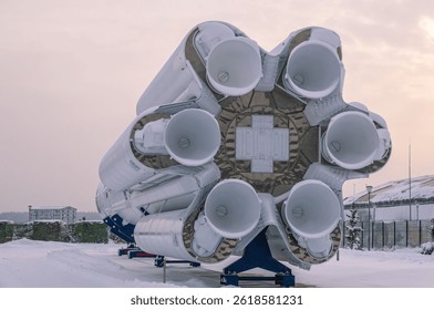 A rocket designed to launch a payload into outer space. A space rocket for delivering astronauts to the orbit of planet Earth. The nozzles of the launch vehicle. Space technology.